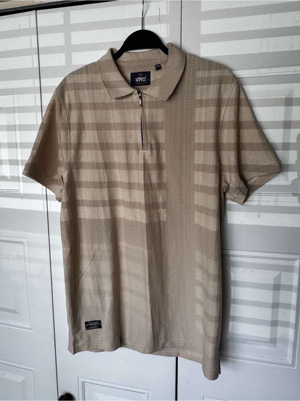 urban pipeline tan zip polo with subtle stripe texture